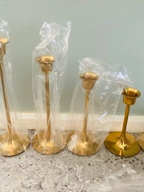 5 Brass Taper Candle Holders with 5 Red candles  staggered sizes never used